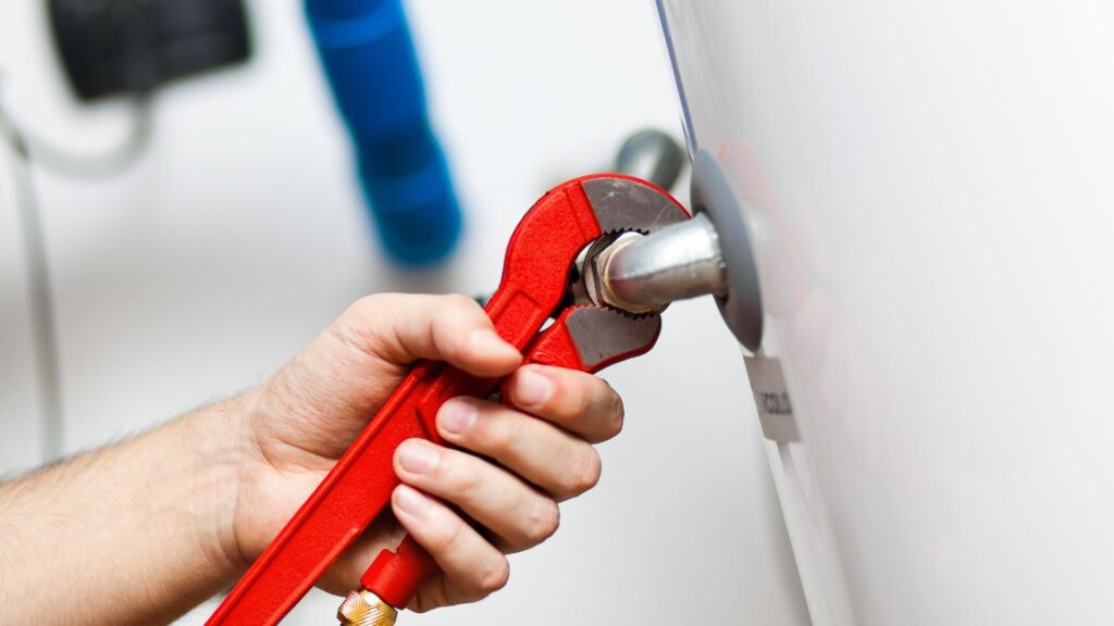 Water Tank Replacement With wrench