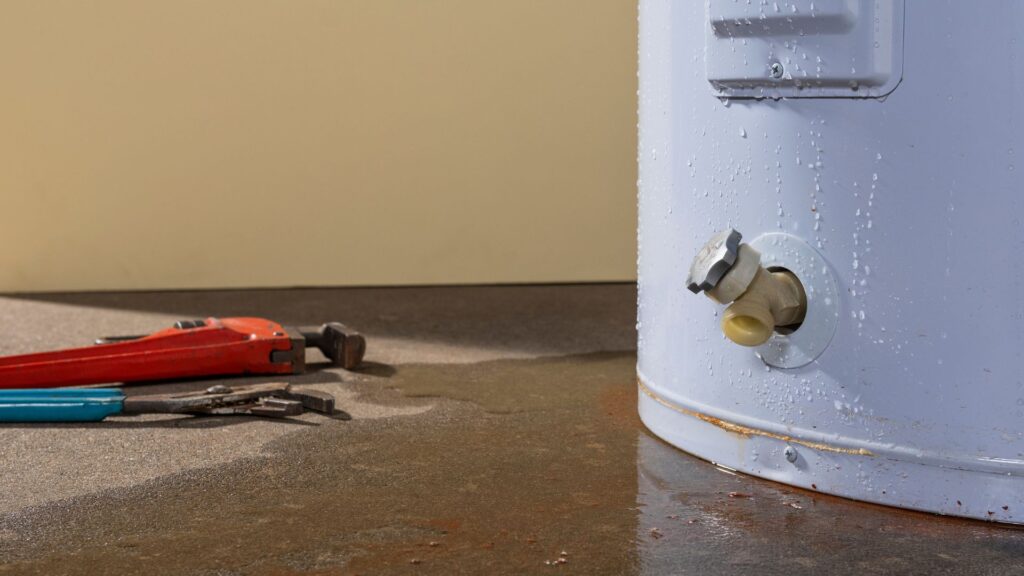 Affordable Water Heater Repair leaking with wrench